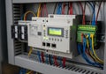 Electrical control panel with various components including a programmable logic controller (PLC) in Royalty Free Stock Photo