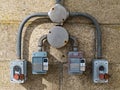 Electrical controls on the exterior of a concrete wall
