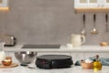 Electrical crepe maker and ingredients on white marble table in kitchen, space for text