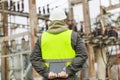 Electrical Engineer in electrical substation Royalty Free Stock Photo