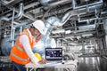 Electrical engineer working at control room of powerhouse