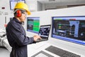 Electrical engineer working at control room of powerhouse Royalty Free Stock Photo