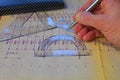 Electrical engineer workplace - electrotechnical project, rulers, and divider compass. Construction and Royalty Free Stock Photo