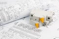 Electrical engineering drawings and circuit breaker Royalty Free Stock Photo