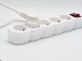 Electrical extension cord on a white background, power board