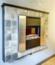 Electrical fireplace on the wall.