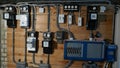 Electrical fuse boxes and power lines in the basement of an old apartment building Royalty Free Stock Photo