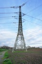 Electrical grid. A lot of high-voltage power line, transmission tower overhead line masts, high voltage pylons as power pylons Royalty Free Stock Photo