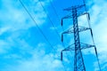 Electrical high voltage pole and blue cloudy sky (Fluorescent Filters) Royalty Free Stock Photo