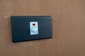 Electrical light dimmer switch on brick wall Royalty Free Stock Photo