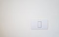 Electrical light swith on white wall with copy space