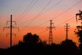 Electrical lines under a night sky with moon Royalty Free Stock Photo