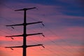 Electrical lines under a night sky with moon Royalty Free Stock Photo