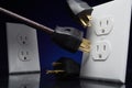 Electrical outlet and three prong plug