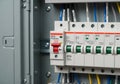 An electrical panel features multiple Ground Fault Circuit Interrupter (GFCI) breakers. The Royalty Free Stock Photo