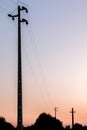 Electrical pillars on sunset Royalty Free Stock Photo