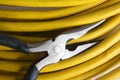 Electrical pliers with yellow cable