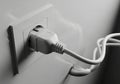 Electrical plug inserted into outlet Royalty Free Stock Photo