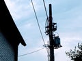 Electrical pole old, telephone and electric wires in europe. Royalty Free Stock Photo