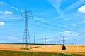 Electrical power line with wind generator Royalty Free Stock Photo