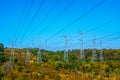 Electrical power lines over the hills Royalty Free Stock Photo