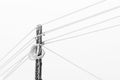 Electrical Power pole with wires in the winter frost. Royalty Free Stock Photo