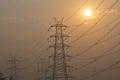 Electrical pylon and high voltage power lines near transformation station at Sunrise in Gurgaon Royalty Free Stock Photo