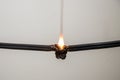 Electrical Short circuit, burnt cable, on white color background Royalty Free Stock Photo