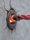 Electrical Short Circuit Causes Burning Wire and Damage Around the Socket Plug in a Residential Building During an Royalty Free Stock Photo