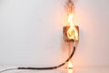 Electrical short circuit. Failure caused by burning wire and rosettes socket plug in house Royalty Free Stock Photo