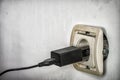 Electrical socket outlet falling out of wall Royalty Free Stock Photo