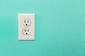 Electrical Sockets In Colorful Bright Teal Wall