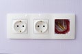 Electrical sockets on a wall. Repair and reconstruction of the outlet