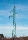 Electrical substation utility pole, state and high voltage power line silhouette with blue cloudy sky at sunset. View of