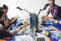 Electrical technicians working on robot electronics parts Royalty Free Stock Photo