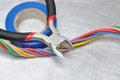 Electrical tools and cables on metal surface Royalty Free Stock Photo