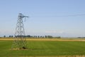 Electrical tower among farm fields