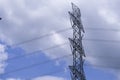 Electrical tower station wiring power with cloudy and blue sky background, High voltage station post