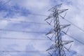 Electrical tower station wiring power with cloudy and blue sky background, High voltage station post