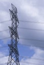 Electrical tower station wiring power with cloudy and blue sky background, High voltage station post