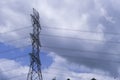 Electrical tower station wiring power with cloudy and blue sky background, High voltage station post