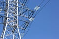 Electrical tower with voltage transmission wires against the background of blue sky. High voltage tower. power line support with Royalty Free Stock Photo