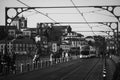 Electrical tram over the dom luis bridge in porto city of portugal in black and white