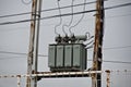 Electrical transformer mounted on electrical pillars Royalty Free Stock Photo