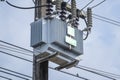 Electrical transformer on a power pole in Thailand, voltage Royalty Free Stock Photo