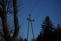 Electrical utility pole captured in the evening Royalty Free Stock Photo