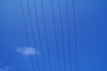 Electrical wires against blue sky Royalty Free Stock Photo
