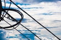 Electrical wires against a cloudy sky Royalty Free Stock Photo