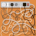 Electrical wires and chargers on orange background. A mess of cables from several extension cords. Cable management Royalty Free Stock Photo