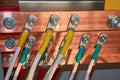 Electrical wires are connected to copper busbars